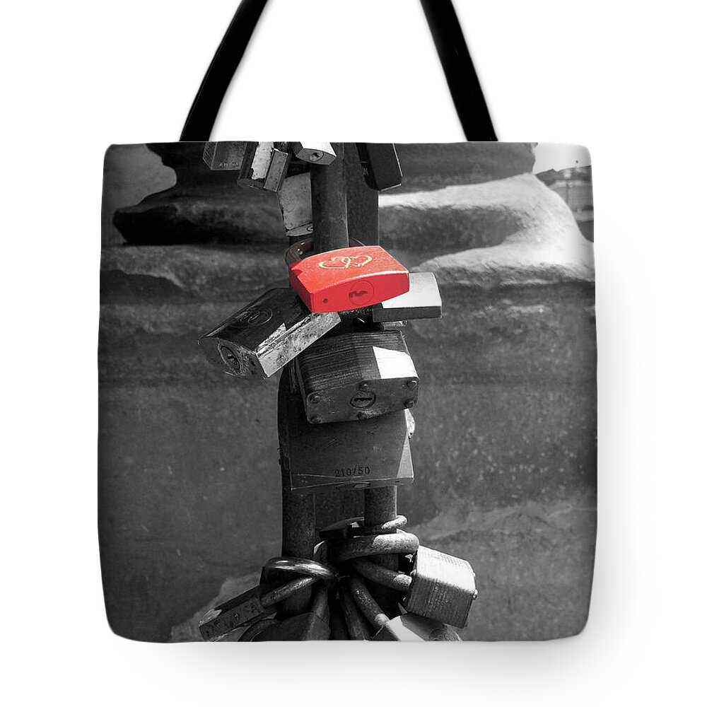 Lock Tote Bag featuring the photograph Love Locks near the Arno river in Florence Italy selective color by Adam Long