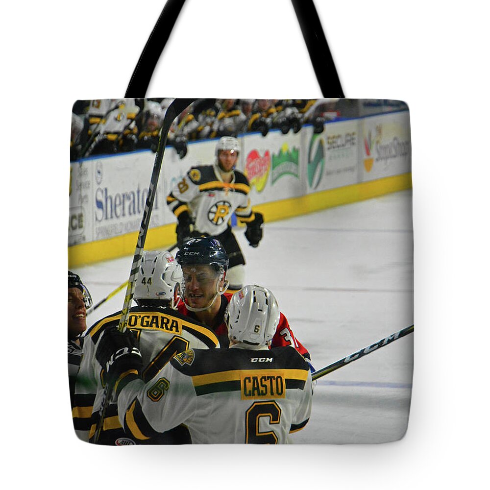 Sports Tote Bag featuring the photograph Love on Ice by Mike Martin