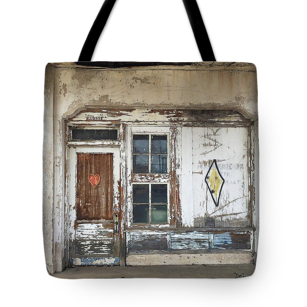 Old Gas Station Tote Bag featuring the photograph Lovingly Abandoned by Peggy Dietz