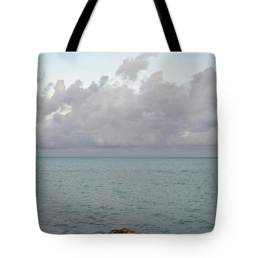 Jetty Tote Bag featuring the photograph Low Clouds Hanging on the Horizon Over the Ocean by DejaVu Designs
