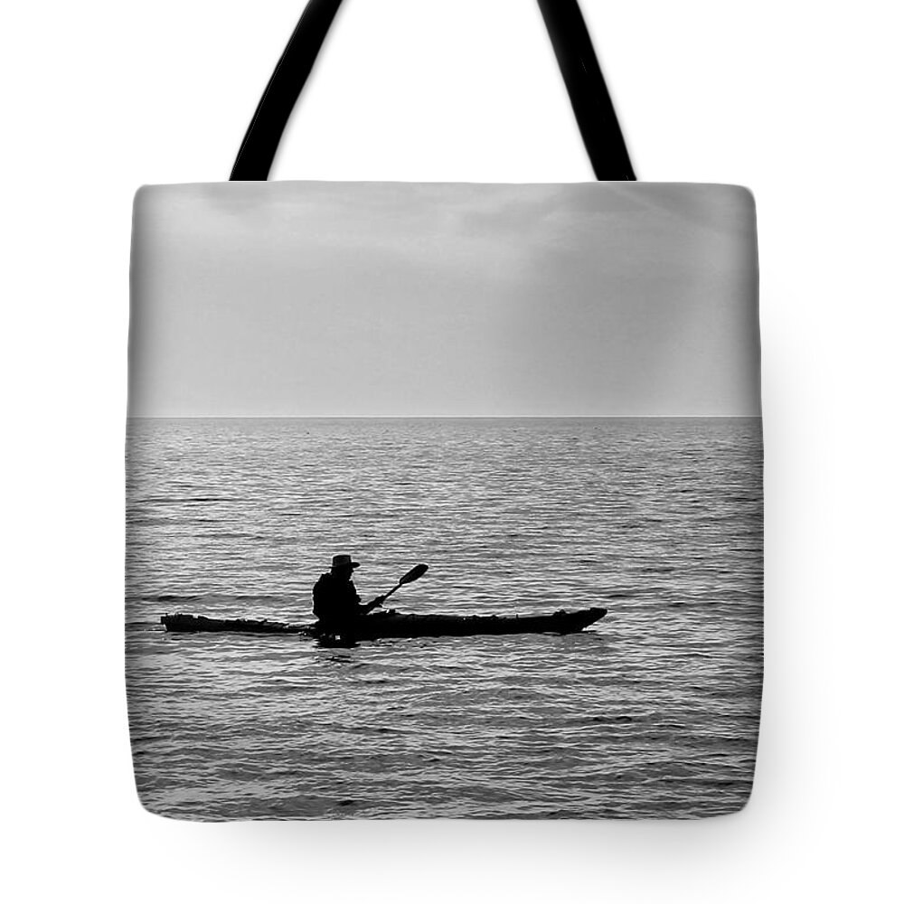 Water Tote Bag featuring the photograph Lone Sea Kayaker by Robert Wilder Jr