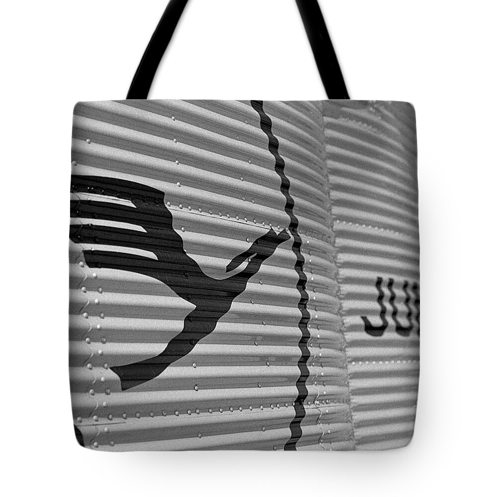 Lufthansa Tote Bag featuring the photograph Lufthansa and Junkers logos by Riccardo Mottola