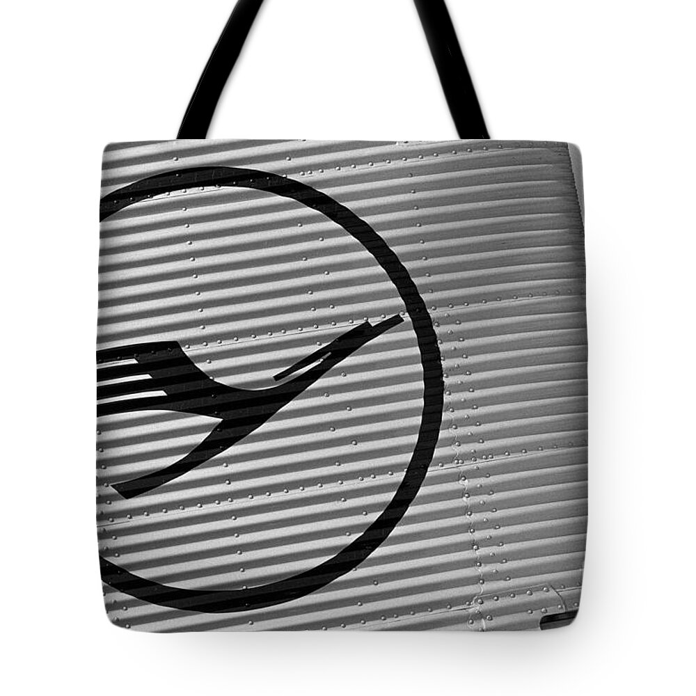 Lufthansa Tote Bag featuring the photograph Lufthansa emblem on Ju-52 by Riccardo Mottola