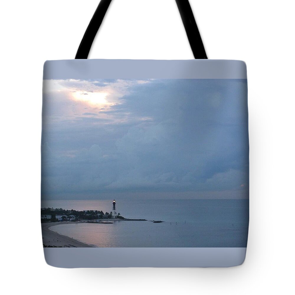 Lighthouse Tote Bag featuring the photograph Luminous Lighthouse by Corinne Carroll