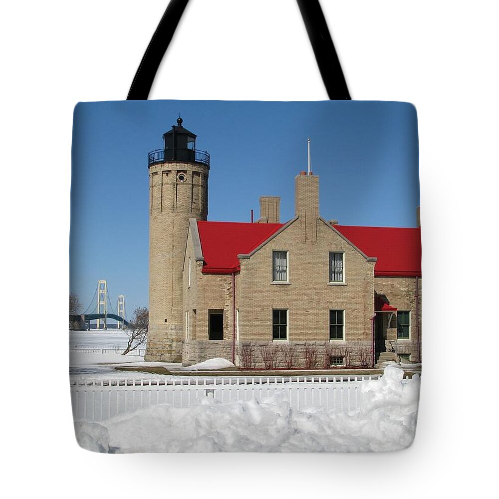 Old Mackinac Point Tote Bag featuring the photograph Mackinac Bridge and Light by Keith Stokes