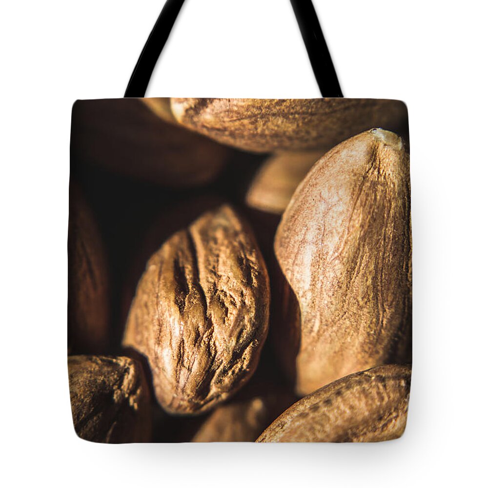 Almonds Tote Bag featuring the photograph Macro Almonds by Jorgo Photography