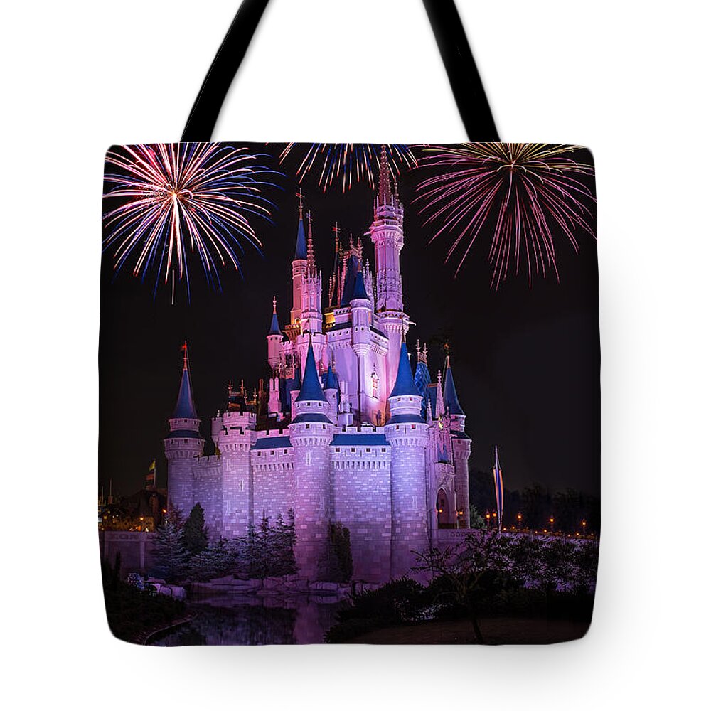 Disney Tote Bag featuring the photograph Magic Kingdom Castle under Fireworks by Chris Bordeleau