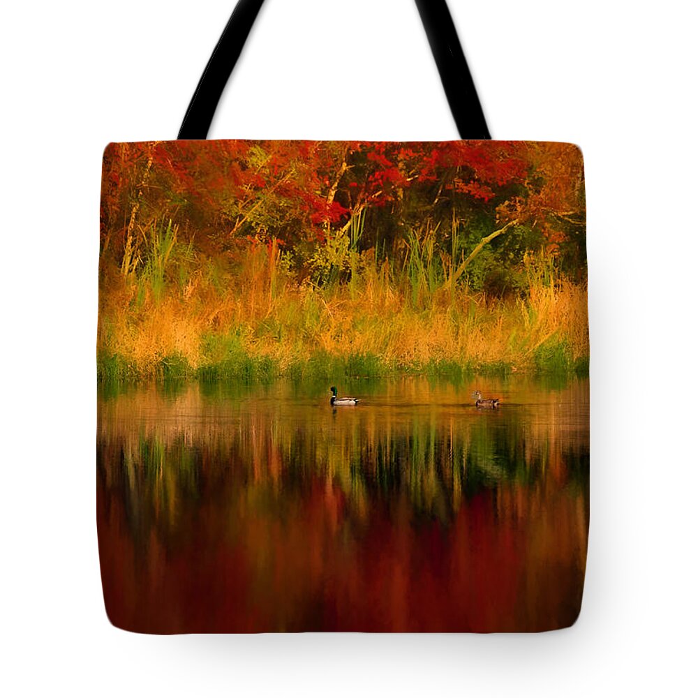 #jefffolger Tote Bag featuring the photograph Mallards through reflection of fall colors by Jeff Folger