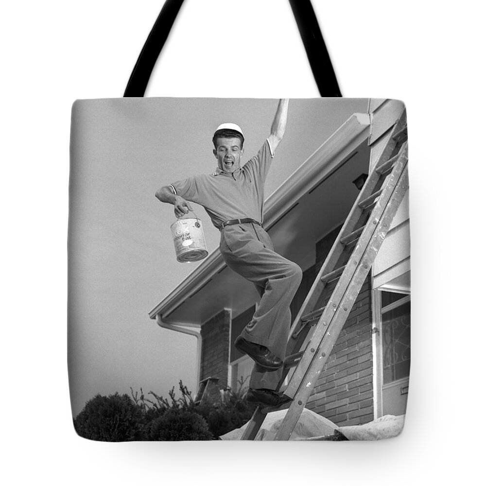 1960s Tote Bag featuring the photograph Man Falling Off Ladder by H. Armstrong Roberts/ClassicStock