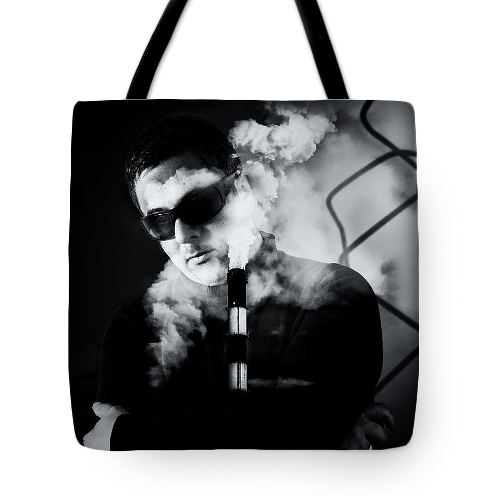 Sunglasses Tote Bag featuring the photograph Man in Sunglasses and Industrial Chimney Stack Creative Image by John Williams