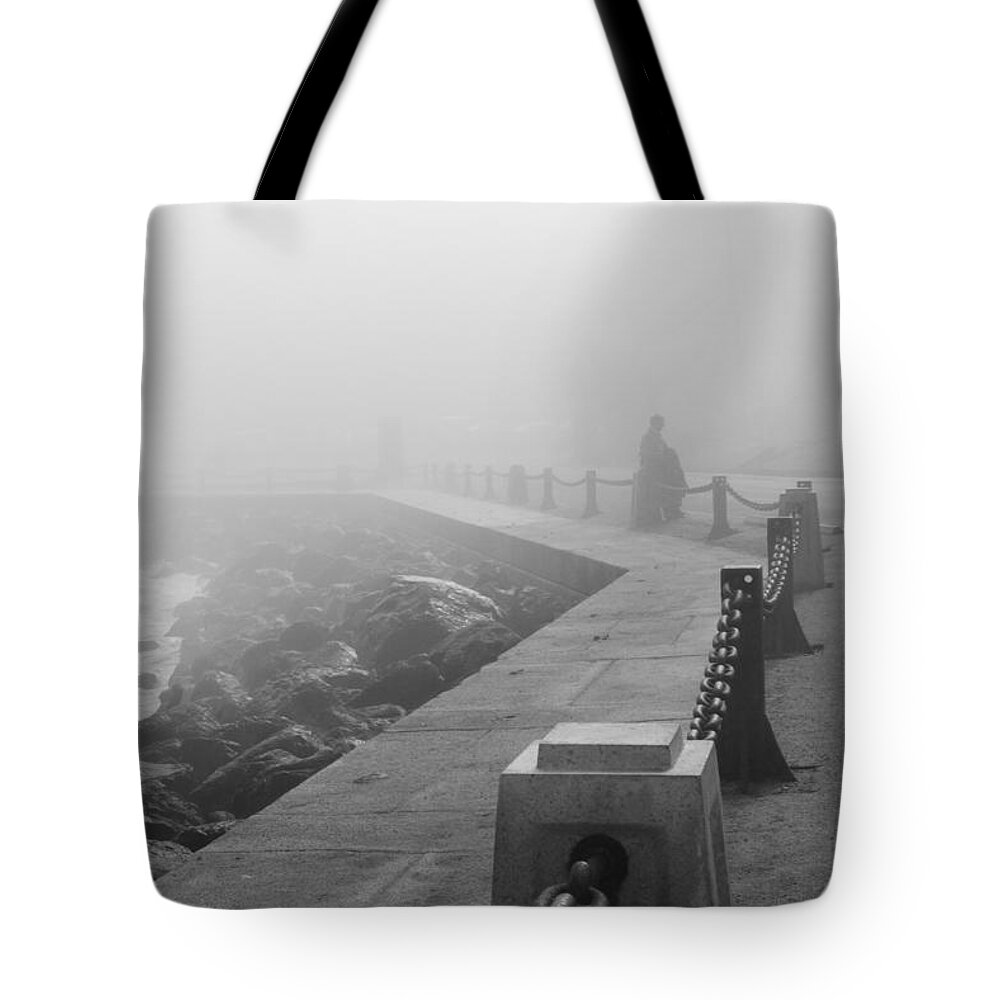 Bonnie Follett Tote Bag featuring the photograph Man Waiting in Fog by Bonnie Follett