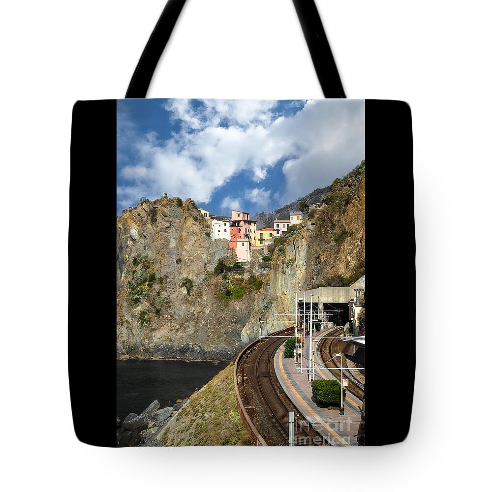 Cinque Terre Tote Bag featuring the photograph Manarola Train Platform by Prints of Italy