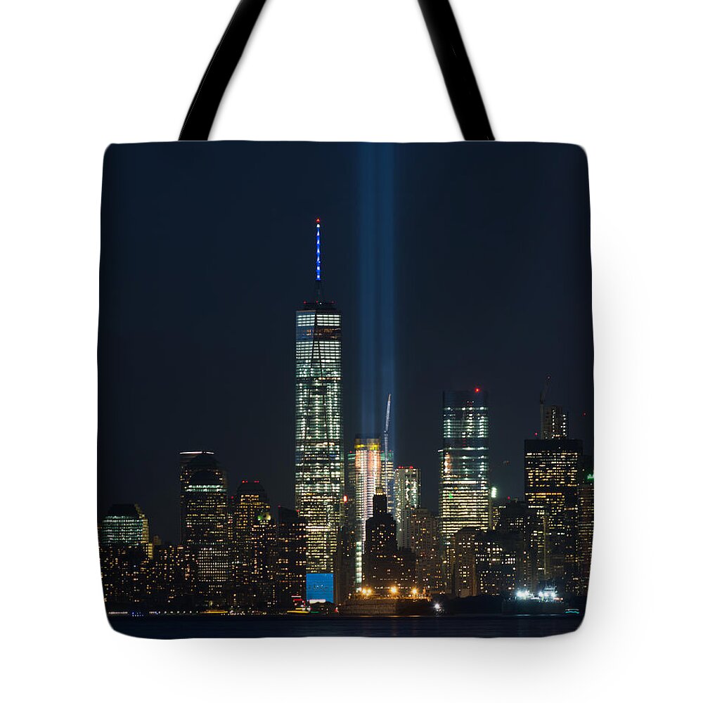 View Of Manhattan New York Freedom Tower And Tribute In Light 9.11.2015 Tote Bag featuring the photograph Manhattan 9.11.2015 by Kenneth Cole