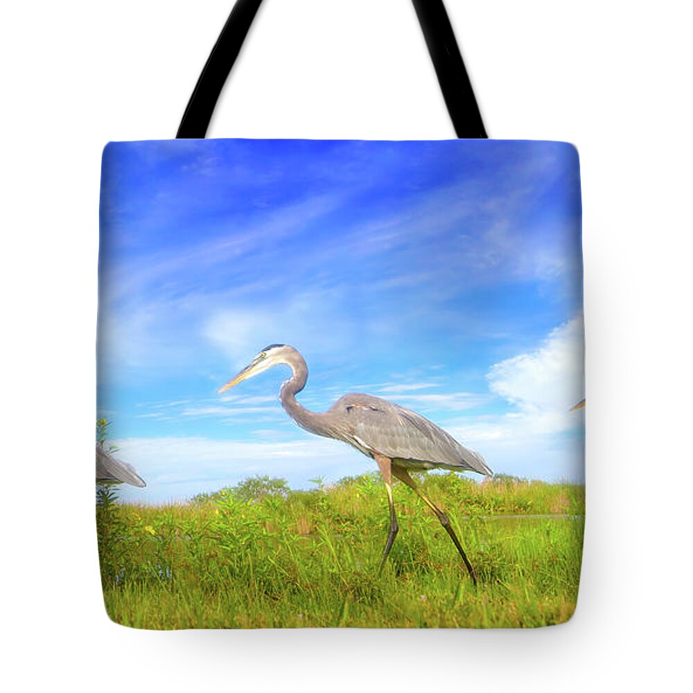 Great Blue Heron Tote Bag featuring the photograph March of the Great Blue Herons by Mark Andrew Thomas