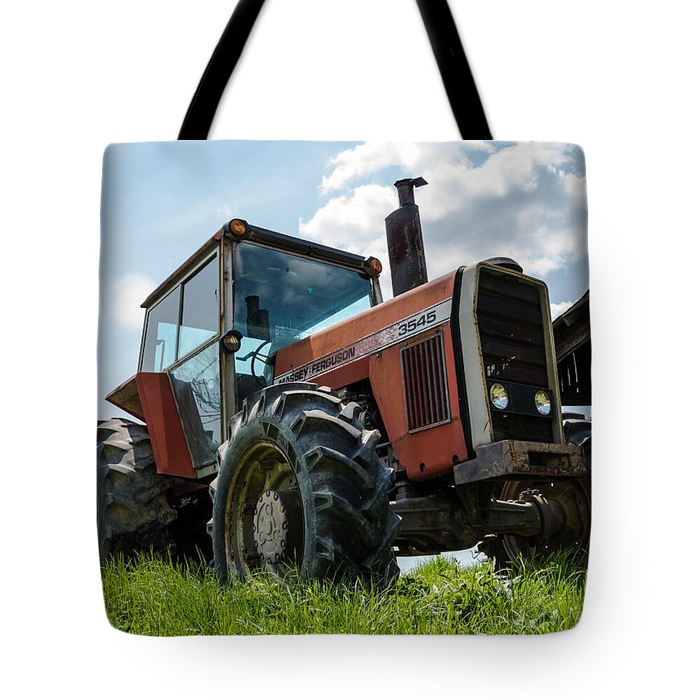 Massey Ferguson Tote Bag featuring the photograph Massey Ferguson 3545 by Holden The Moment