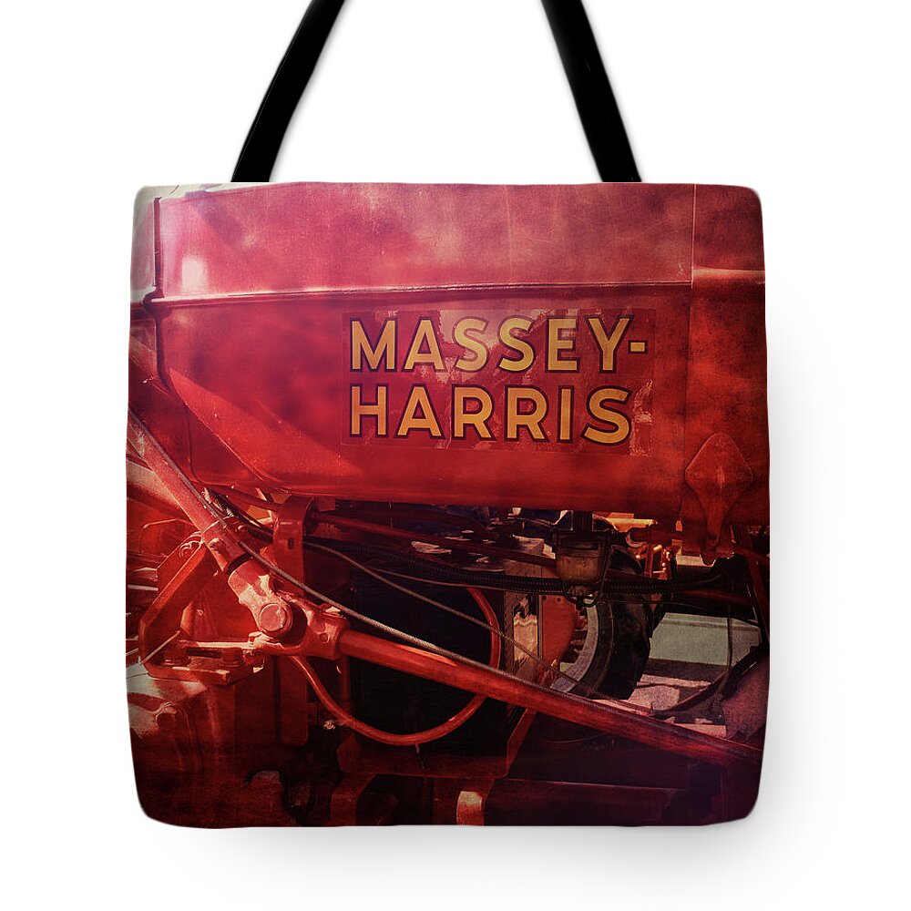 Tractor Tote Bag featuring the photograph Massey Harris Vintage Tractor by Ann Powell