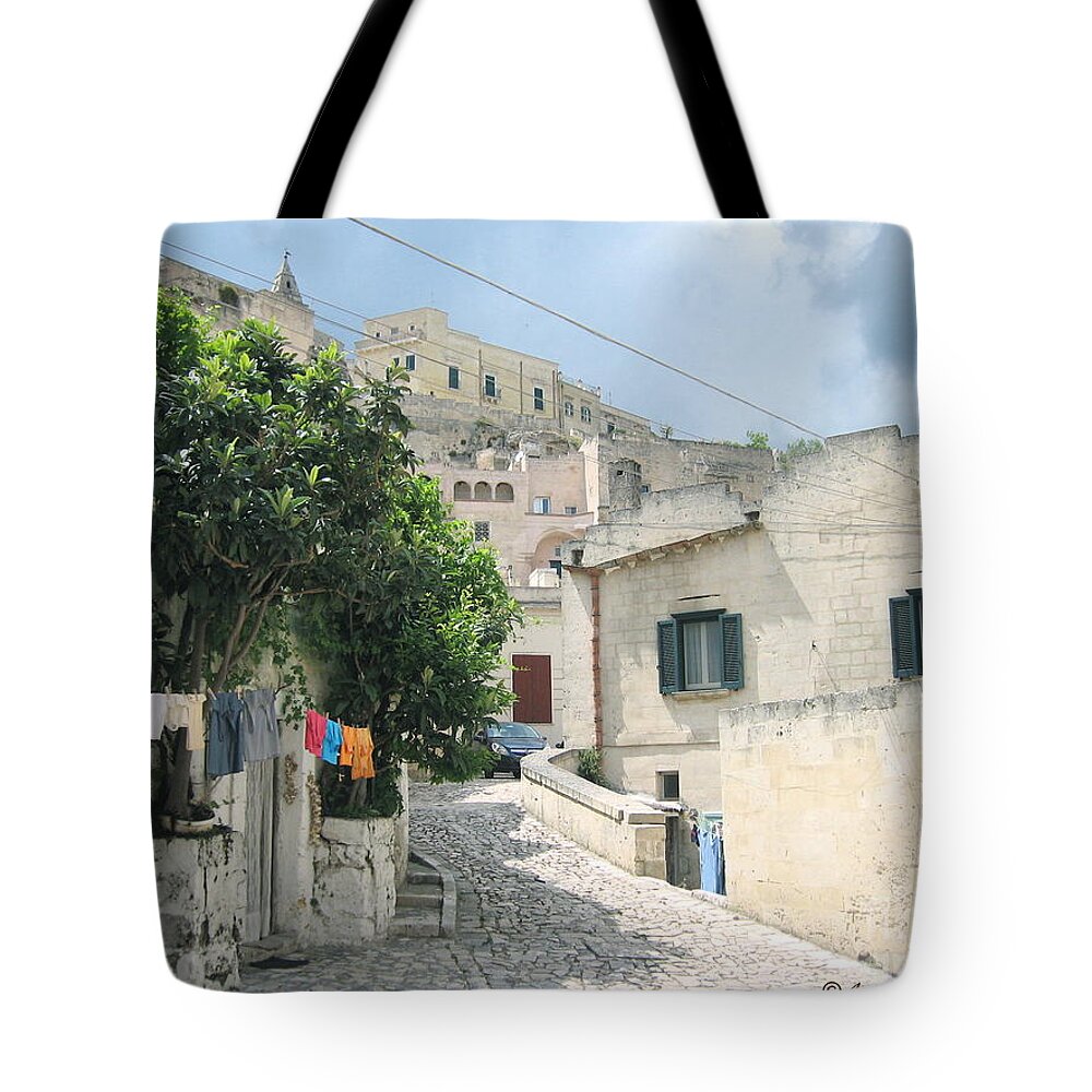 Cityscape Tote Bag featuring the photograph Matera's colorful Laundry by Italian Art