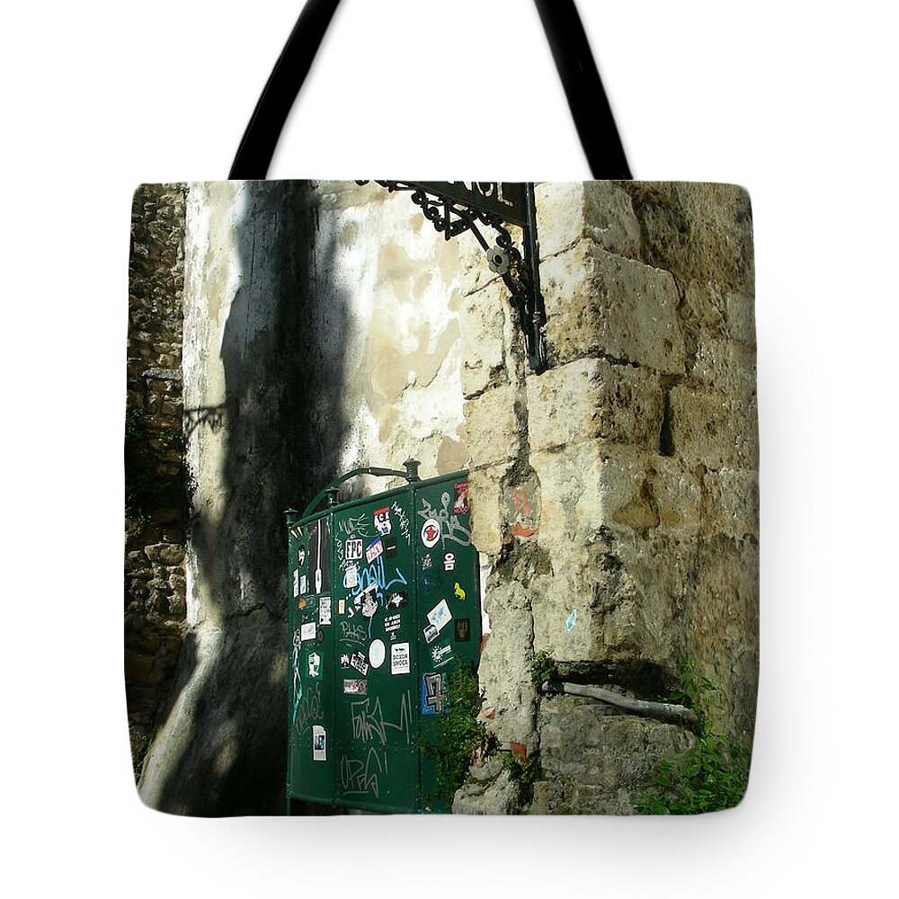 Men's Room Tote Bag featuring the photograph Men's Room by Jean Wolfrum