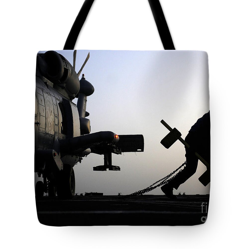 Mh-60r Sea Hawk Helicopter Is Ready For Duty Tote Bag featuring the painting MH-60R Sea Hawk helicopter is ready for duty by Celestial Images