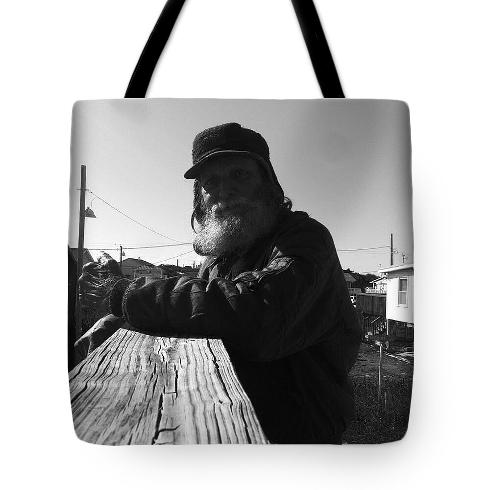 Mick Tote Bag featuring the photograph Mick lives across the street not in the streets by WaLdEmAr BoRrErO