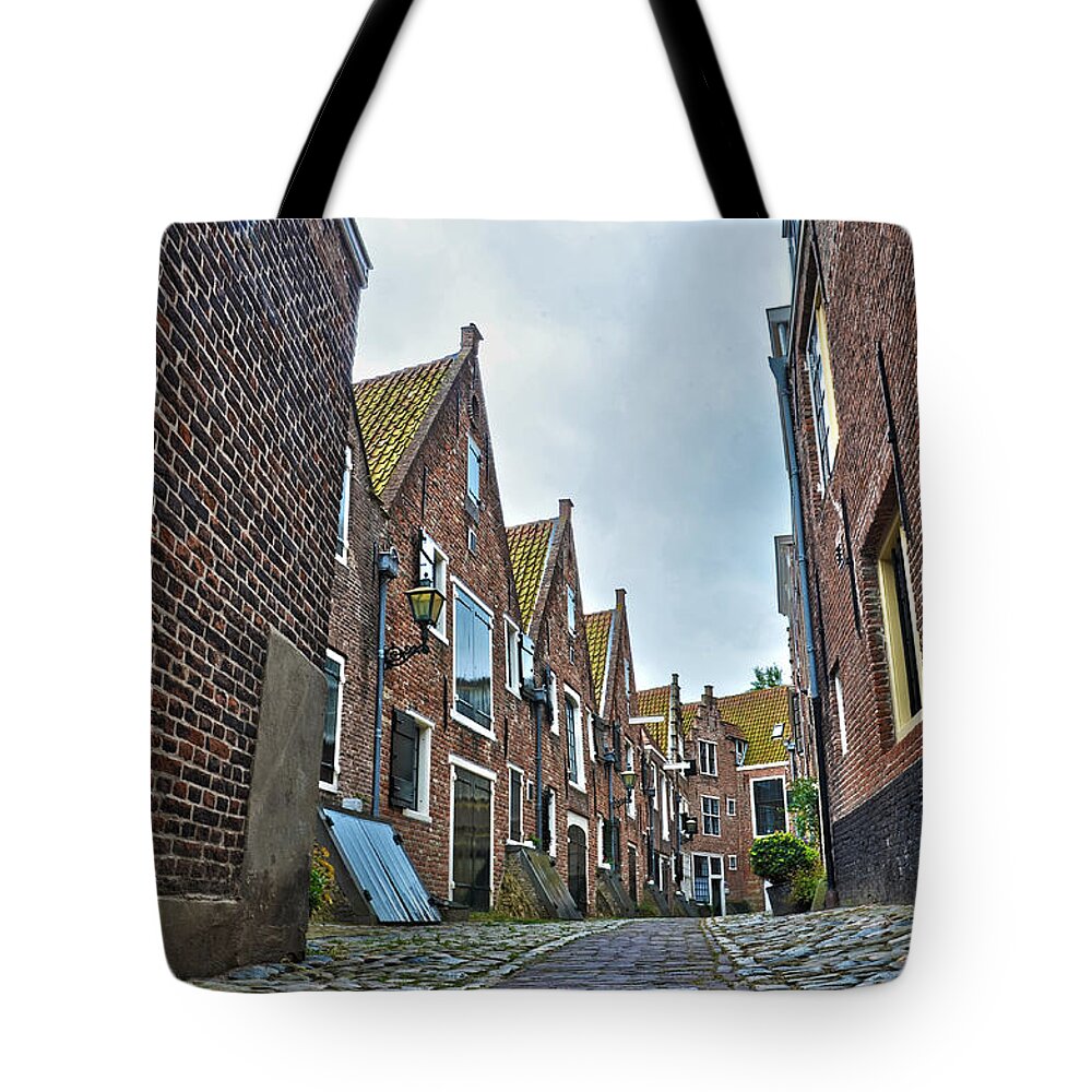 Alley Tote Bag featuring the photograph Middelburg Alley by Frans Blok