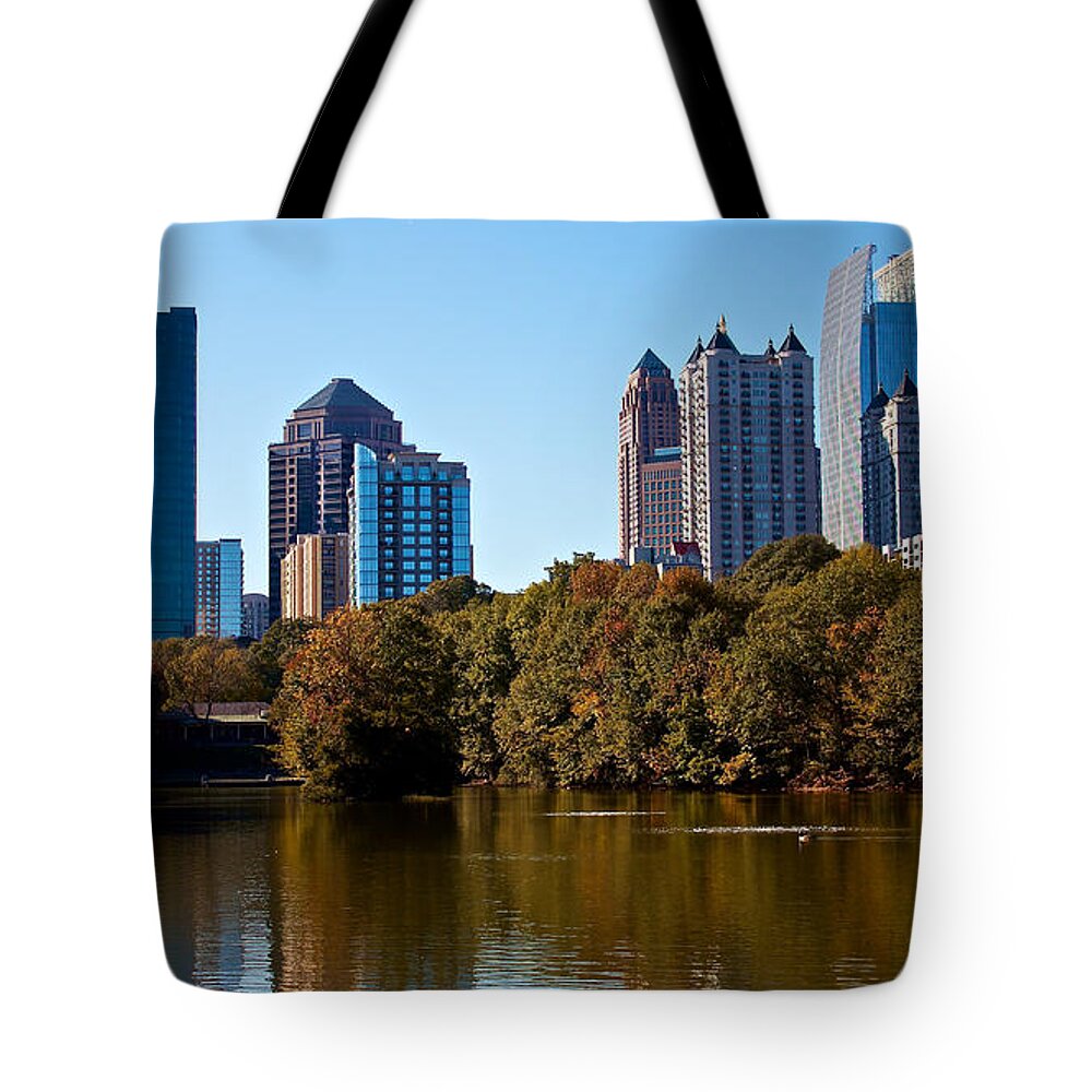Cityscape Tote Bag featuring the photograph Midtown in the Fall by Mike Dunn