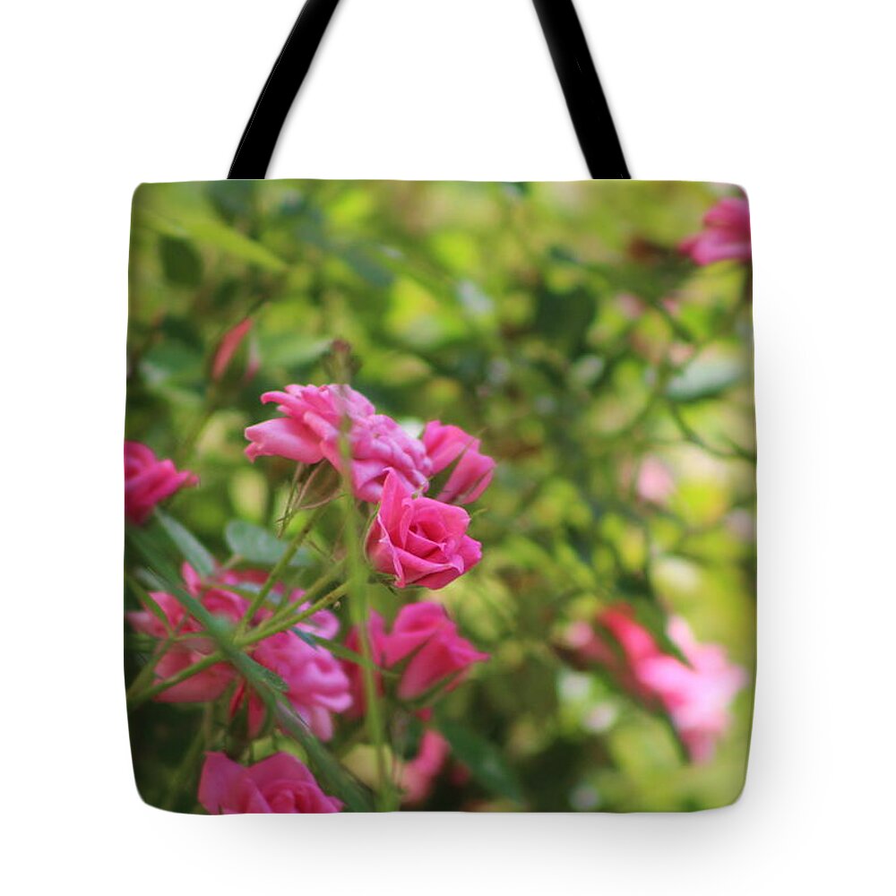 Miniature Rose Tote Bag featuring the photograph Miniature Fuchsia Roses by Colleen Cornelius