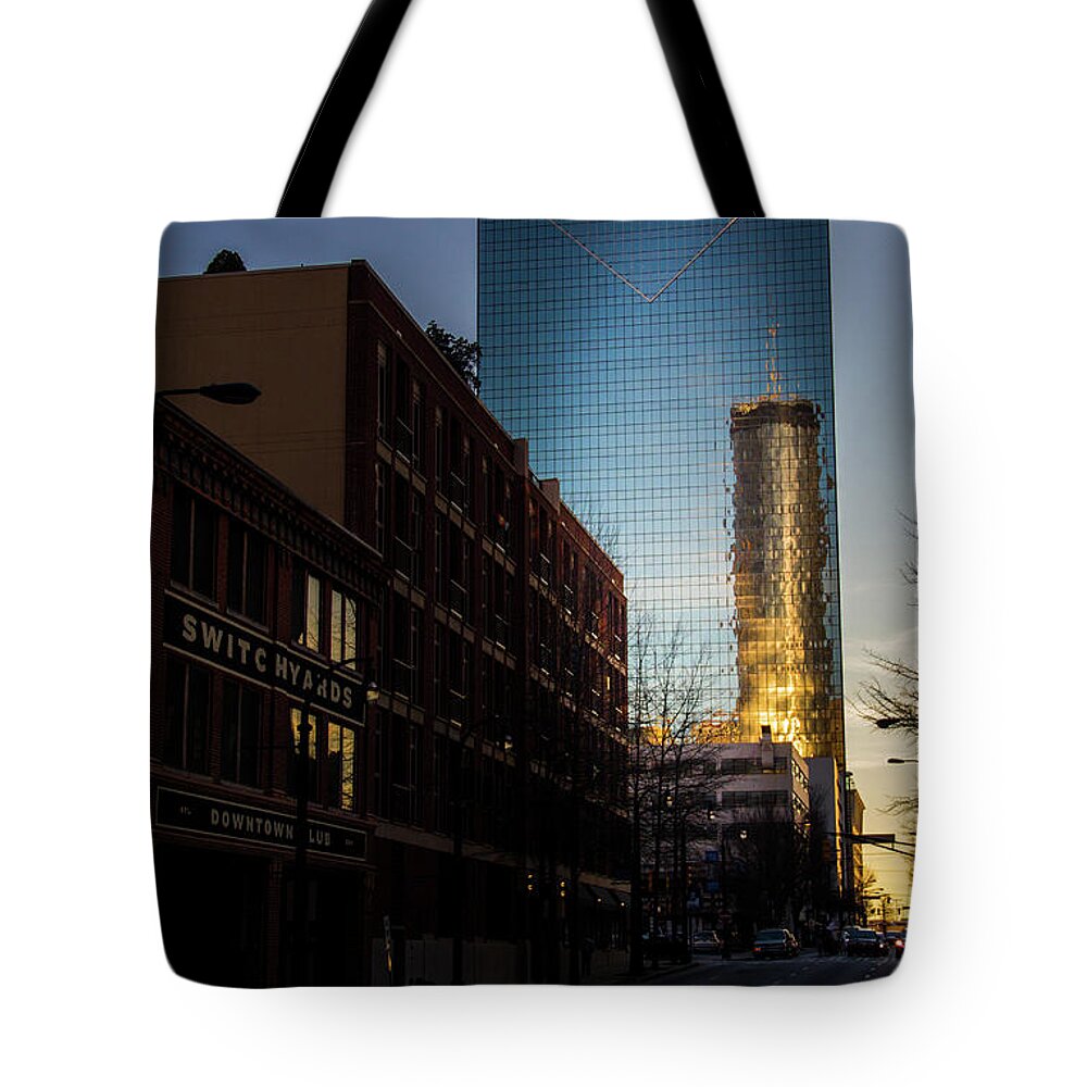 Reflection Tote Bag featuring the photograph Mirror Reflection of Peachtree Plaza by Kenny Thomas
