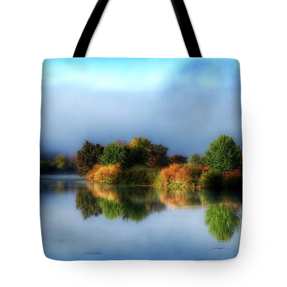 Misty Fall Colors On The River Tote Bag featuring the photograph Misty fall colors on the river by Lynn Hopwood