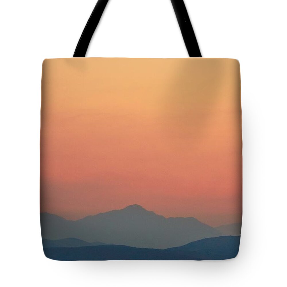 Mountain Silhouettes Tote Bag featuring the photograph Misty Mountains by Angela J Wright