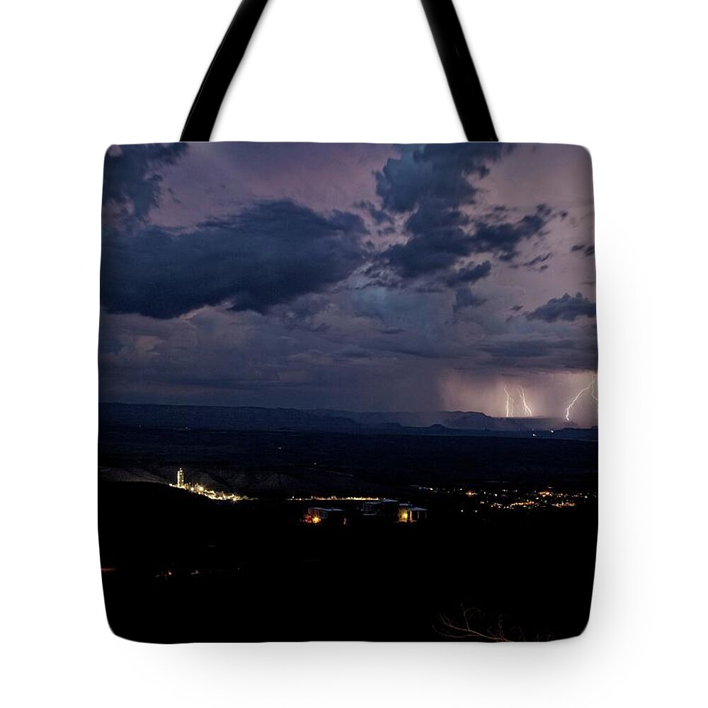 Dramatic Tote Bag featuring the photograph Monsoon Lightning over Sedona from Jerome AZ by Ron Chilston