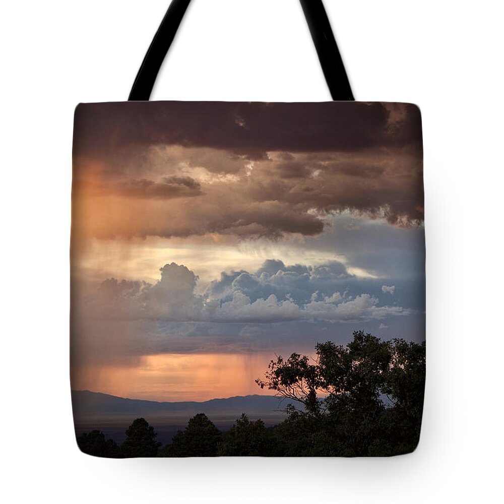 Sunset Tote Bag featuring the photograph Monsoon Rains by Diana Powell
