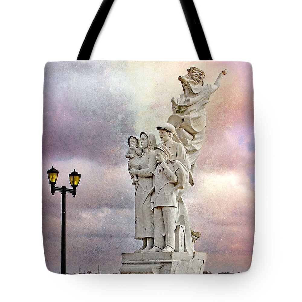 Monument To The Immigrant Tote Bag featuring the photograph Monument To The Immigrant by Iryna Goodall