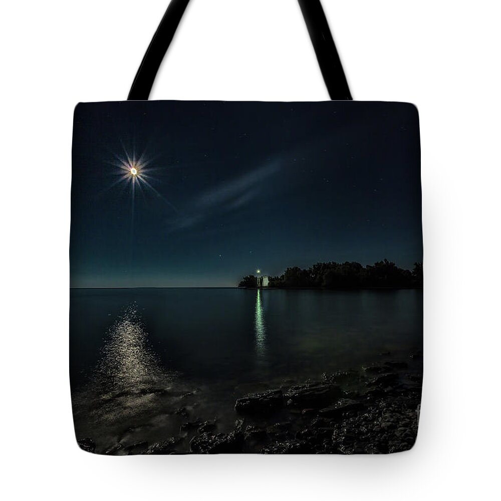 Blue Tote Bag featuring the photograph Moonllight over Pointe Traverse by Roger Monahan