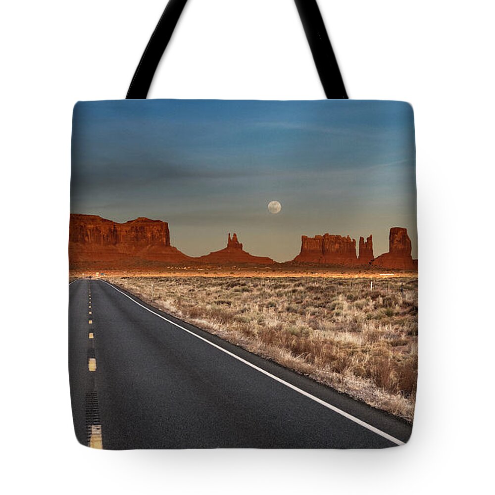 © 2018 Lou Novick All Rights Reserved Tote Bag featuring the photograph Moonrise over Monument Valley by Lou Novick