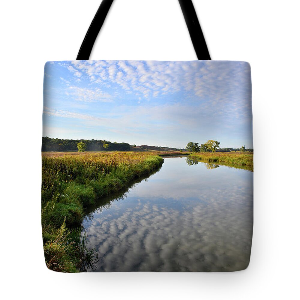 Mchenry County Conservation District Tote Bag featuring the photograph Morning Clouds Reflected in Nippersink Creek in Glacial Park by Ray Mathis