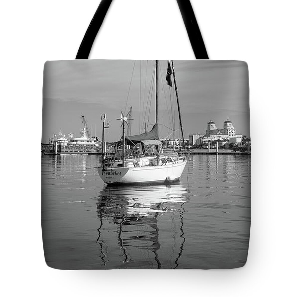 Boats Tote Bag featuring the photograph Morning Float in Black and White by Debra and Dave Vanderlaan