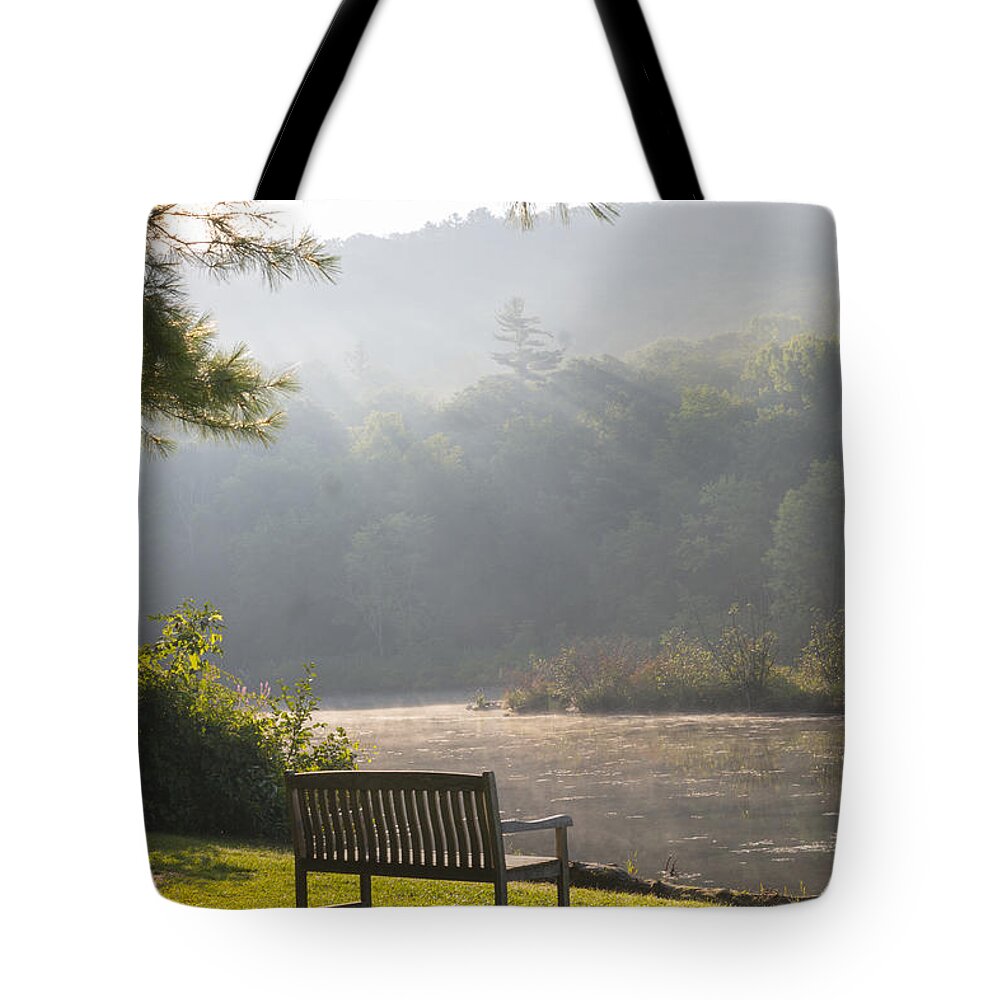 Pond Tote Bag featuring the photograph Morning rays on the pond and bench by Vance Bell