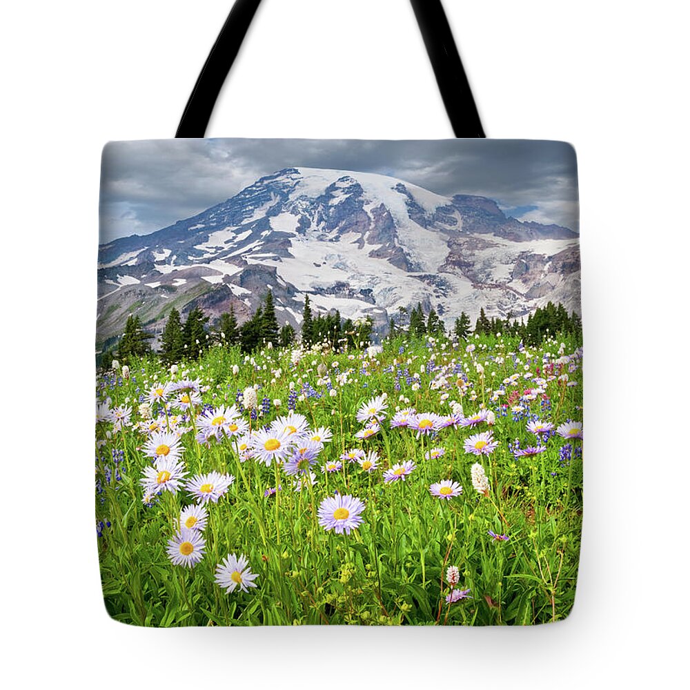 Alpine Tote Bag featuring the photograph Mount Rainier and a Meadow of Aster by Jeff Goulden