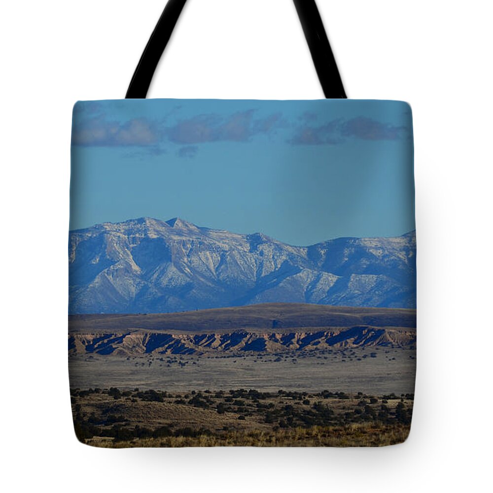Southwest Landscape Tote Bag featuring the photograph Mountain range at dusk by Robert WK Clark