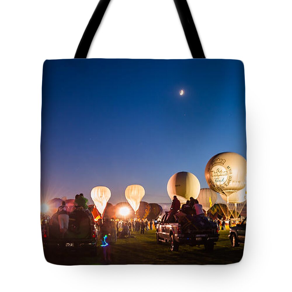 Multiple Hot Air Balloons Tote Bag featuring the photograph Multiple Hot air Balloons night glow by Charles McCleanon