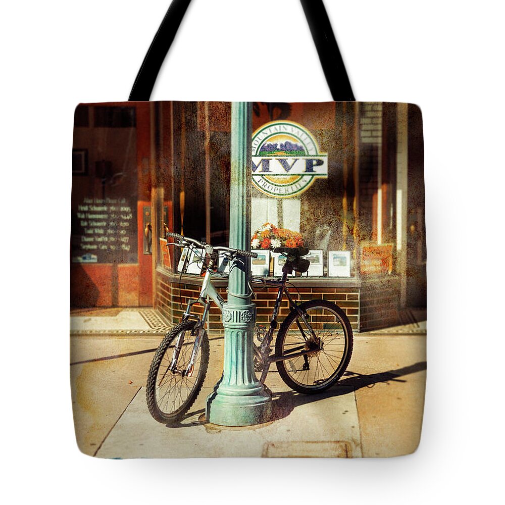 Bicycle Tote Bag featuring the photograph MVP Laramie Bicycle by Craig J Satterlee