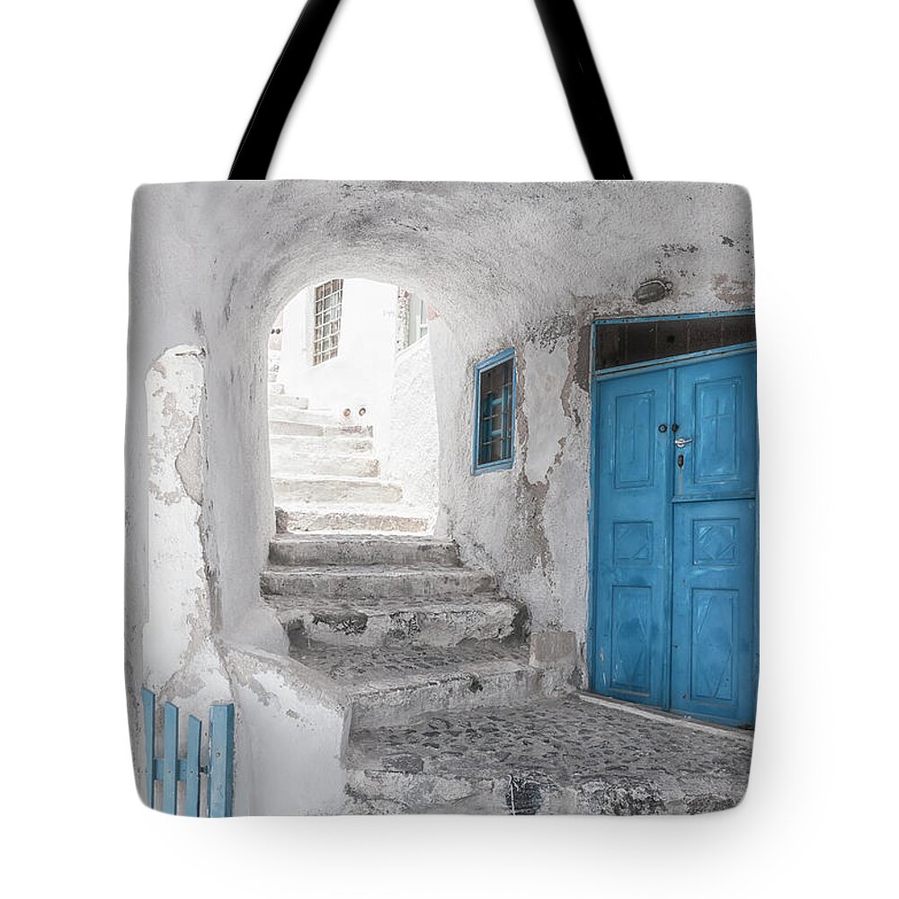 Santorini Tote Bag featuring the photograph Narrow Alley and stairway on Santorini by Antony McAulay