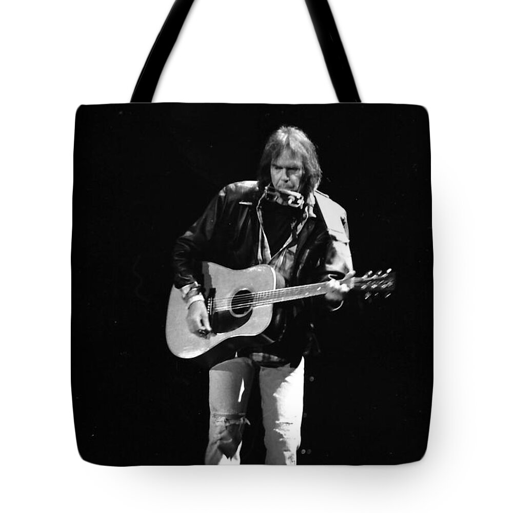 Neil Young Tote Bag featuring the photograph Neil Young by Wayne Doyle