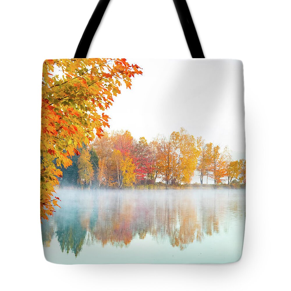 Haley Pond Tote Bag featuring the photograph New England fall colors of Maine by Jeff Folger
