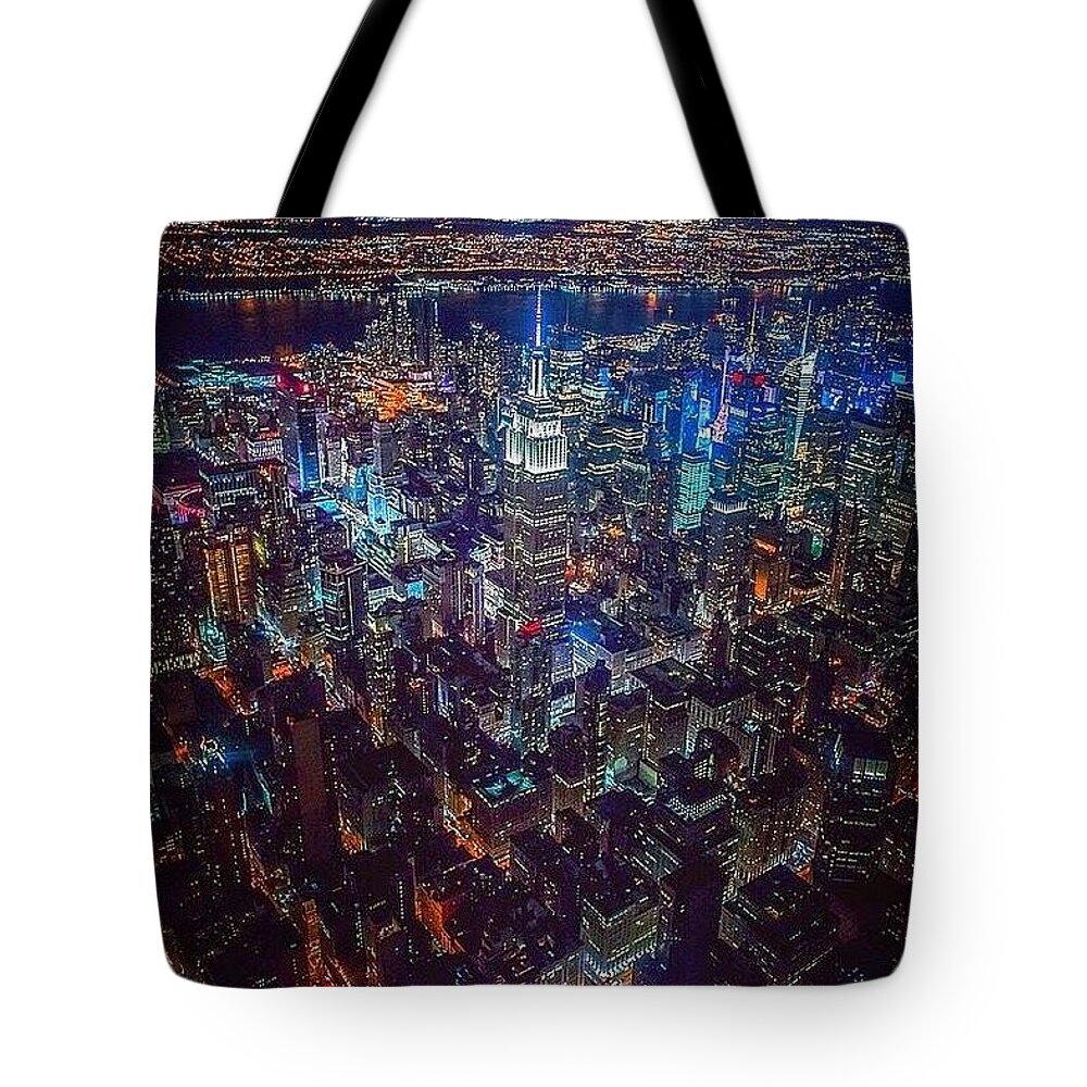 New York City Is The Largest City In The United States And New York. Over 8 Million People Live In It Tote Bag featuring the photograph New York City by Andy Bucaille