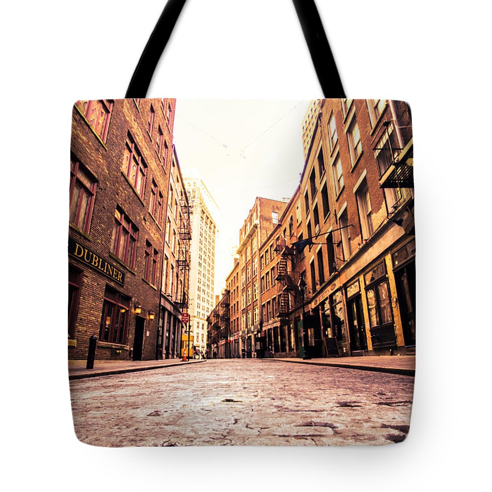 Nyc Tote Bag featuring the photograph New York City's Stone Street by Vivienne Gucwa