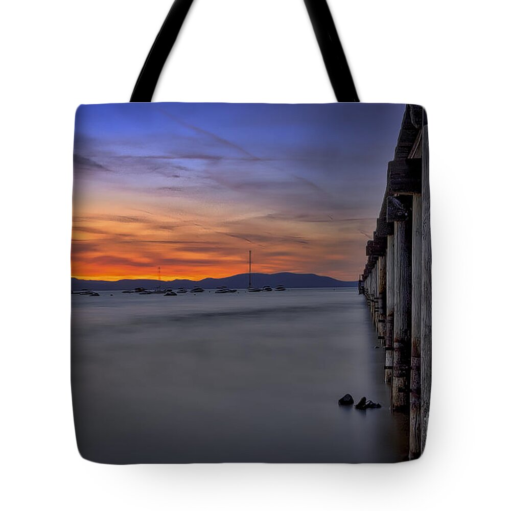 Timber Cove Tote Bag featuring the photograph Next To Nothing by Mitch Shindelbower