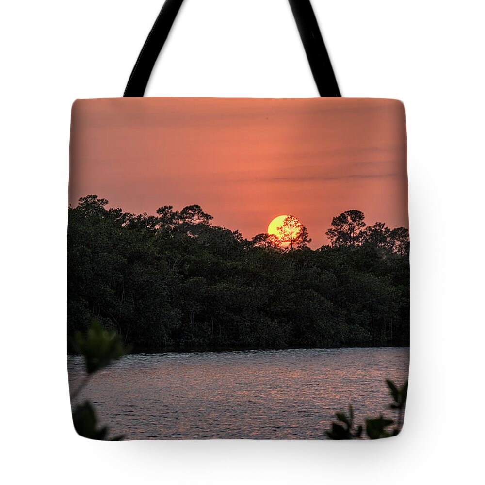 North Port Florida Tote Bag featuring the photograph North Port Sunset by Tom Singleton