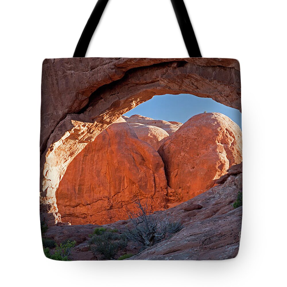 Arches National Park Tote Bag featuring the photograph North Window Arch by Fred Stearns